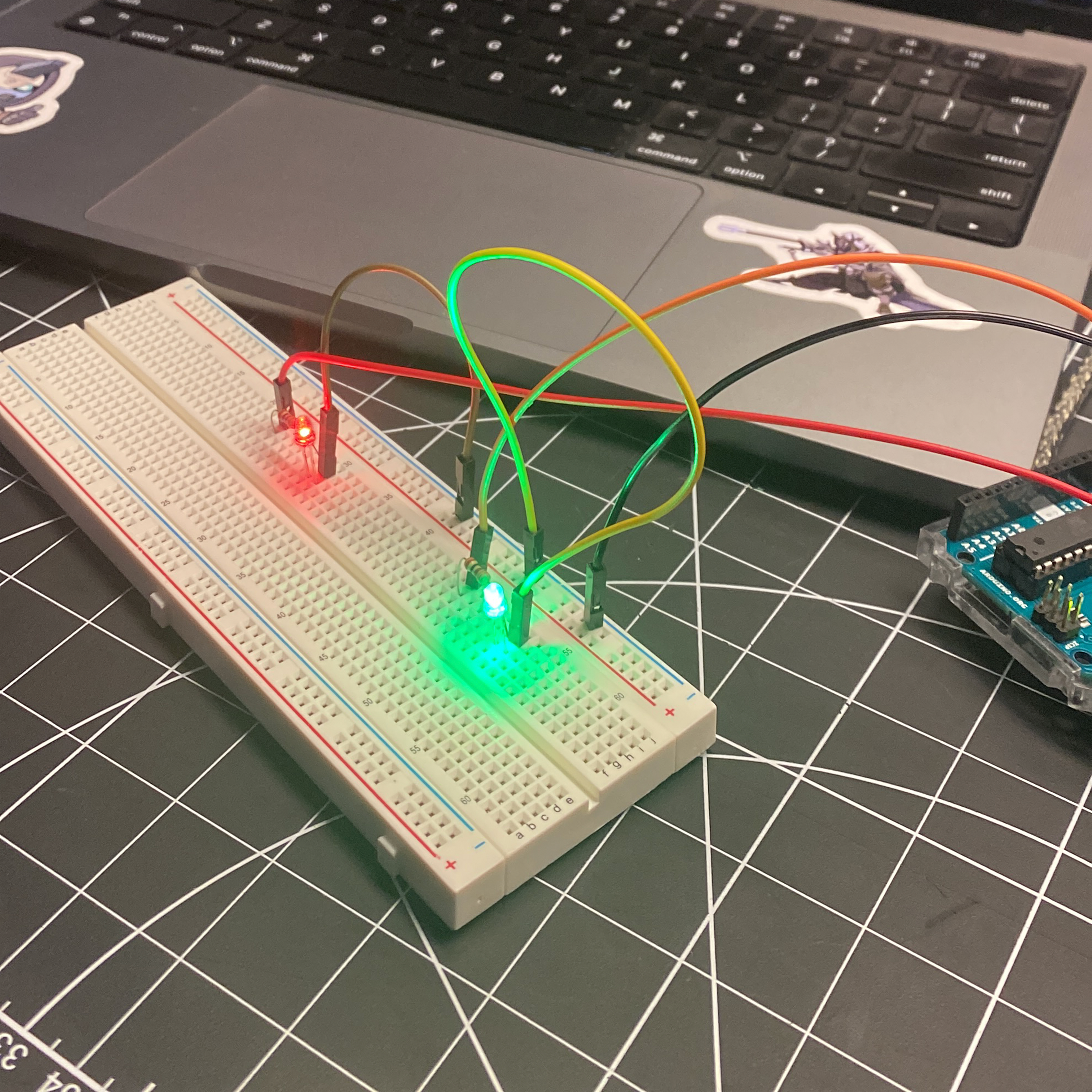 These are two blinking lights paired with the Arduino IDE that alternate in when they blink. They are programmed to blink at different times. We experimented to have them blink at the same time and explored different timings.