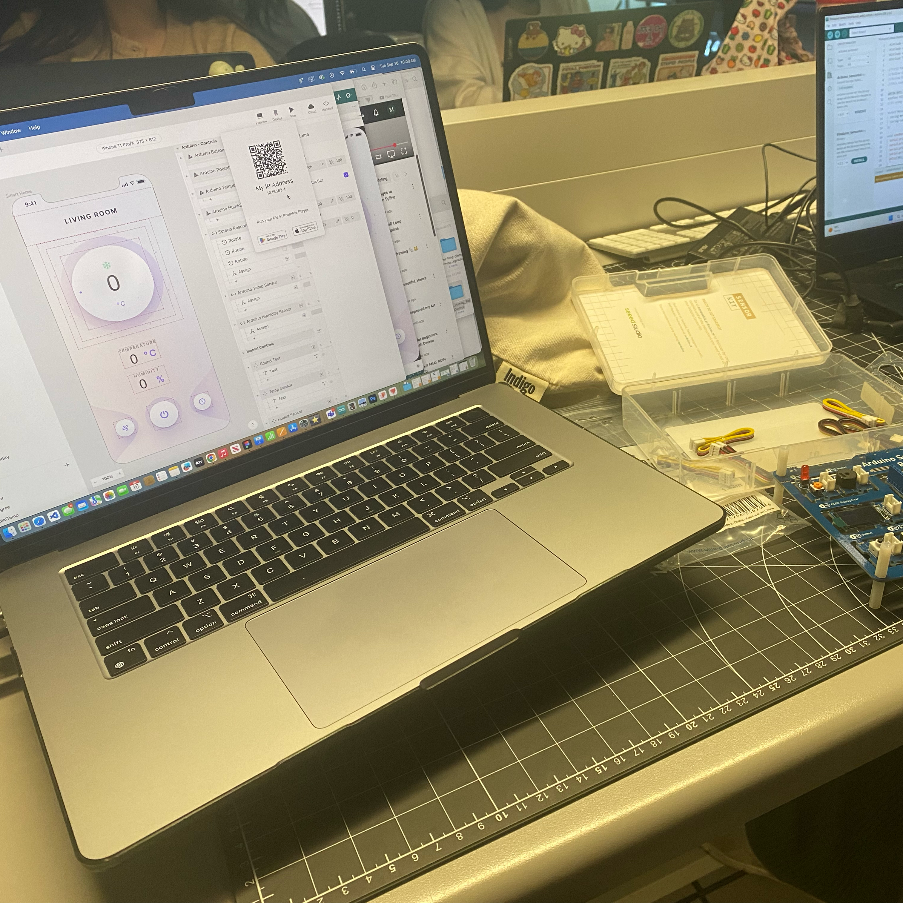 Opening the ProtoPie file given to us and scanning the QR code to use it on our phones. This way, we can control the ProtoPie file straight from our mobile device in real time.