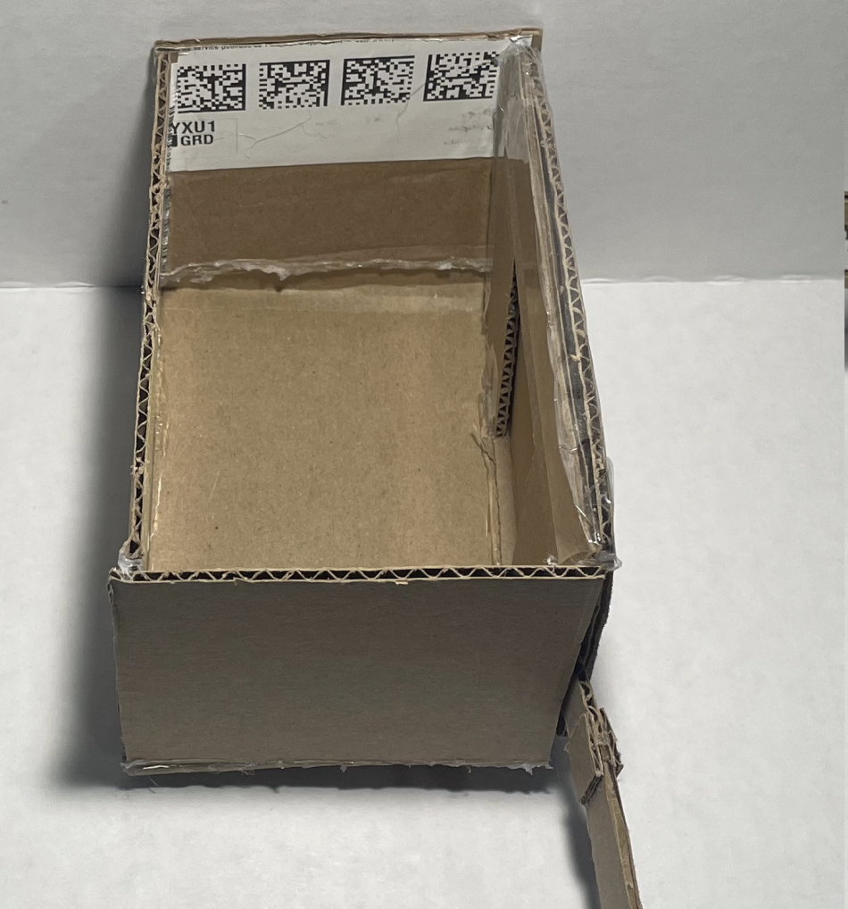 Top view of miniature cardboard prototype for the pod.